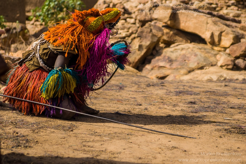 Traditional Dogon mask kneeling